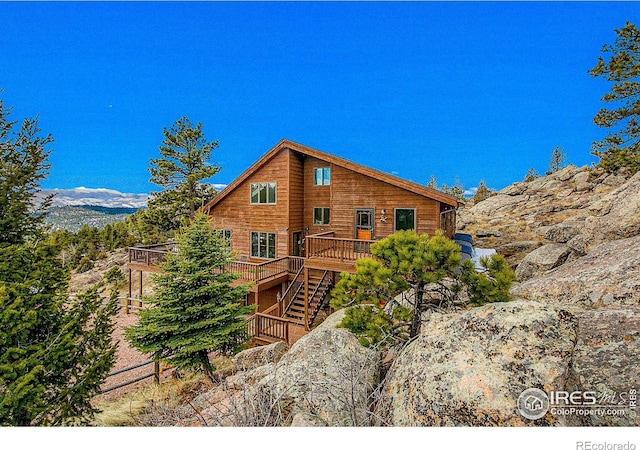 131 Mount Apiatan Ct, Livermore, CO 80536 - exterior space featuring a wooden deck and stairway