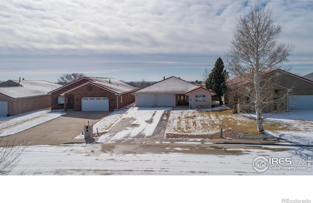 view of front of home with a garage