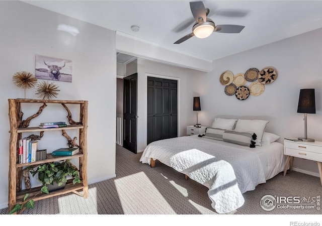 bedroom with carpet floors, ceiling fan, and baseboards