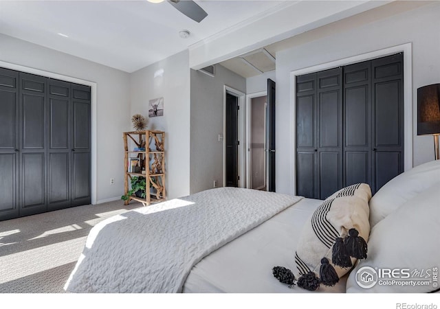 carpeted bedroom with a ceiling fan