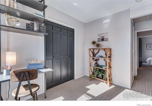 entryway with light colored carpet and baseboards