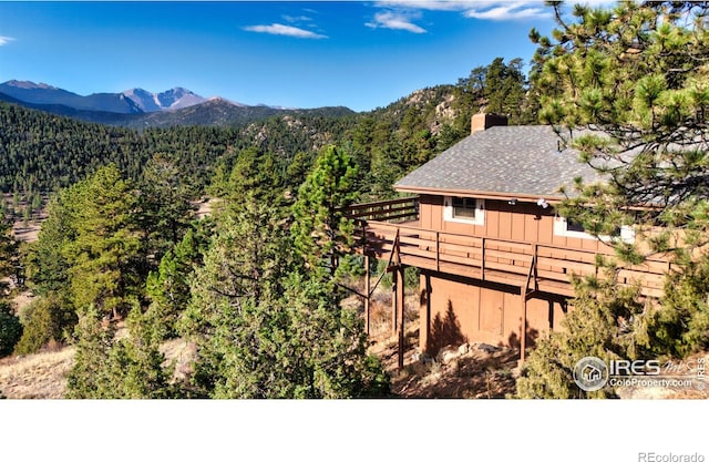 property view of mountains with a forest view