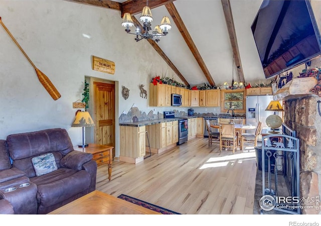 living area with high vaulted ceiling, light wood-type flooring, a notable chandelier, and beamed ceiling