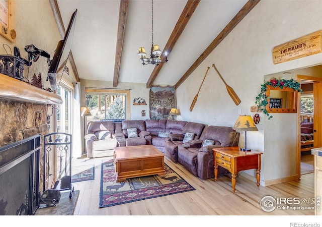 living room with a fireplace with flush hearth, vaulted ceiling with beams, an inviting chandelier, and wood finished floors