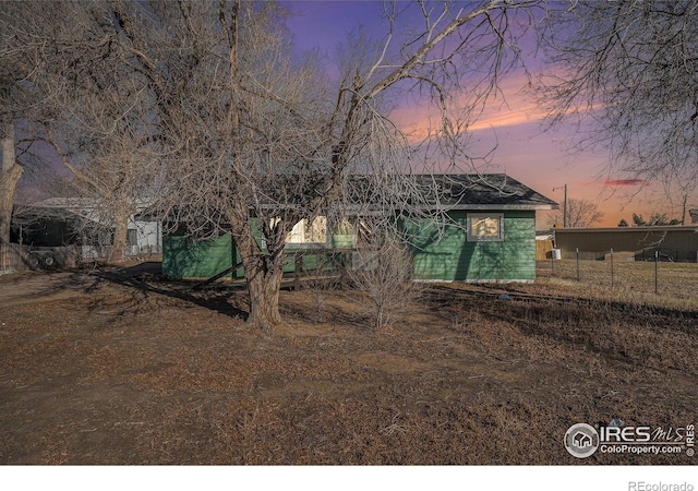 view of front of property with fence