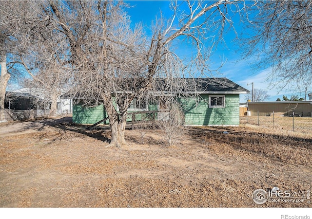 view of front of home with fence