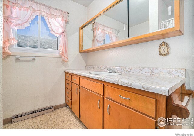 bathroom featuring visible vents and vanity