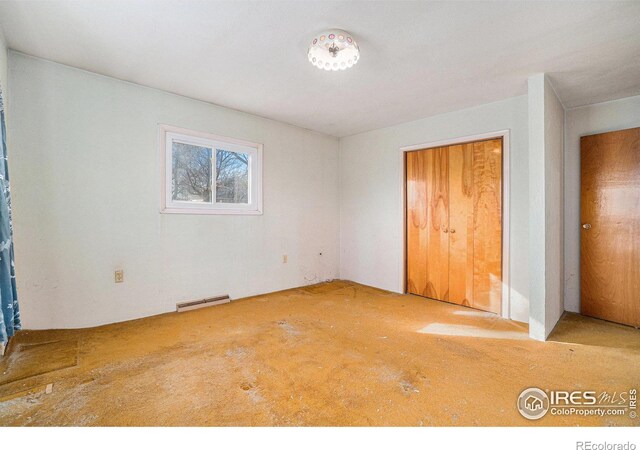 unfurnished bedroom featuring visible vents