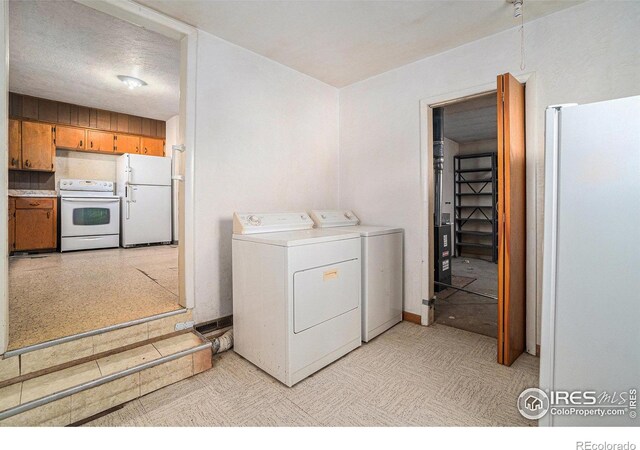 laundry area with laundry area and washing machine and dryer