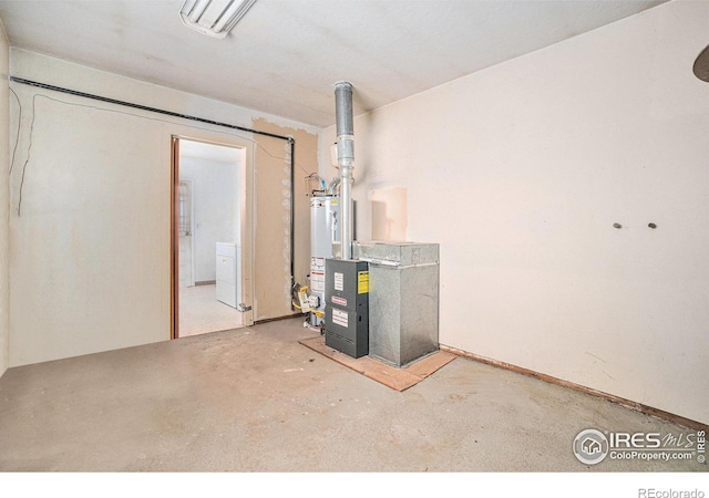 utility room with water heater and visible vents