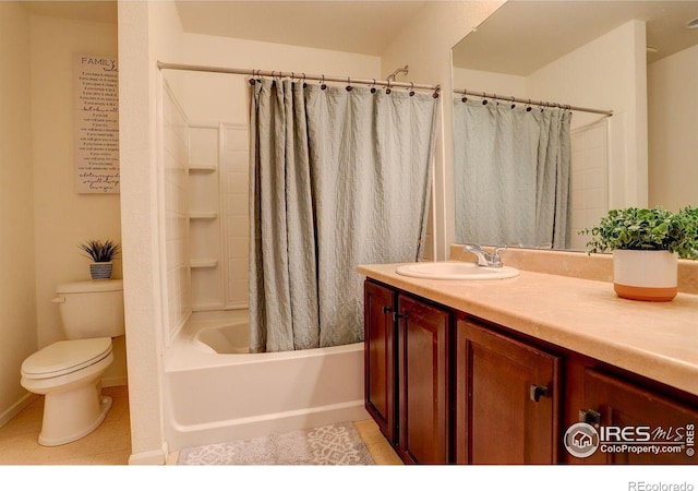 bathroom with toilet, tile patterned flooring, shower / bath combo, and vanity