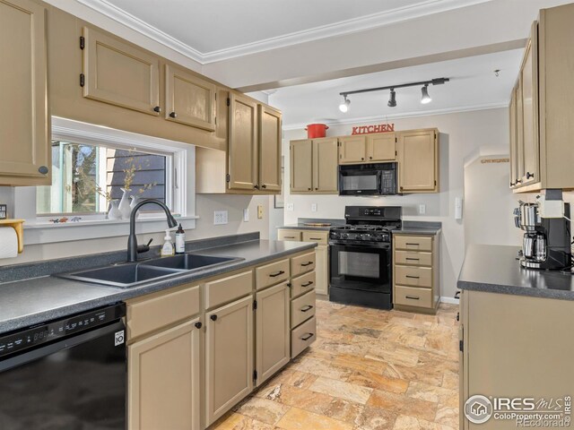 kitchen featuring black appliances, dark countertops, a sink, and crown molding