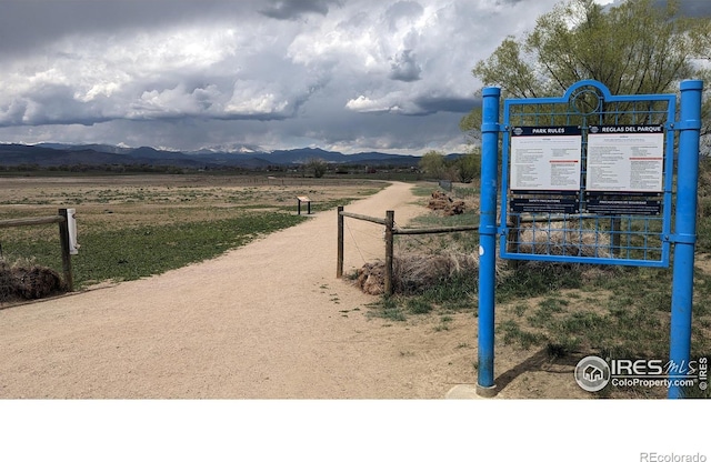 surrounding community with a mountain view and a rural view