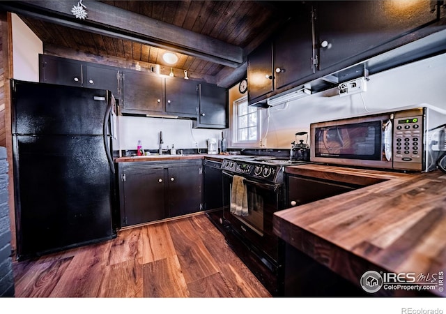 kitchen featuring dark wood-style flooring, a sink, wood ceiling, black appliances, and beamed ceiling