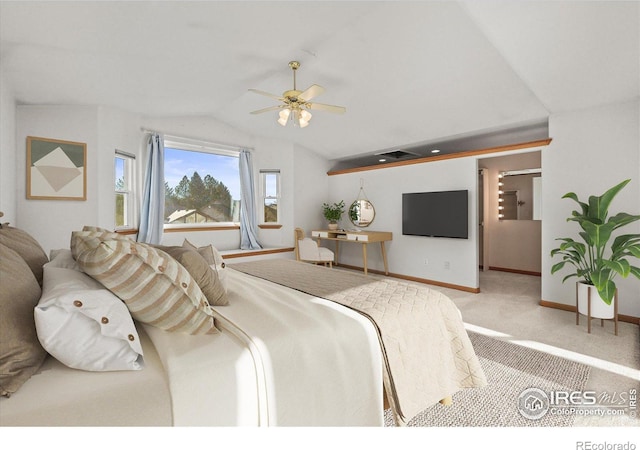 carpeted bedroom with lofted ceiling, baseboards, and a ceiling fan