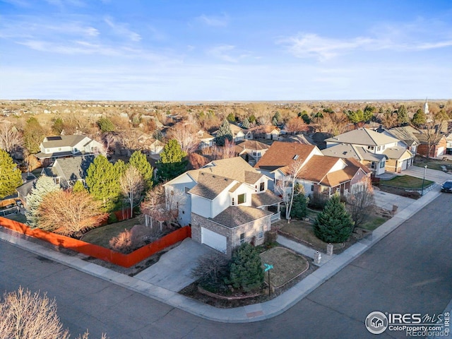 drone / aerial view with a residential view