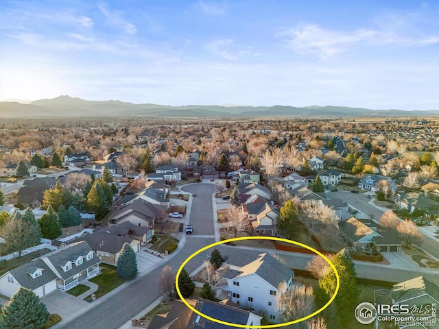 aerial view featuring a residential view and a mountain view