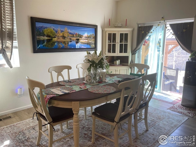 1431 Vantage Pkwy, Berthoud, CO 80513 - dining room featuring wood finished floors and baseboards