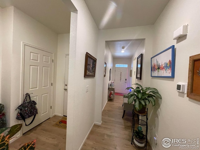 1431 Vantage Pkwy, Berthoud, CO 80513 - hall featuring wood finished floors and baseboards