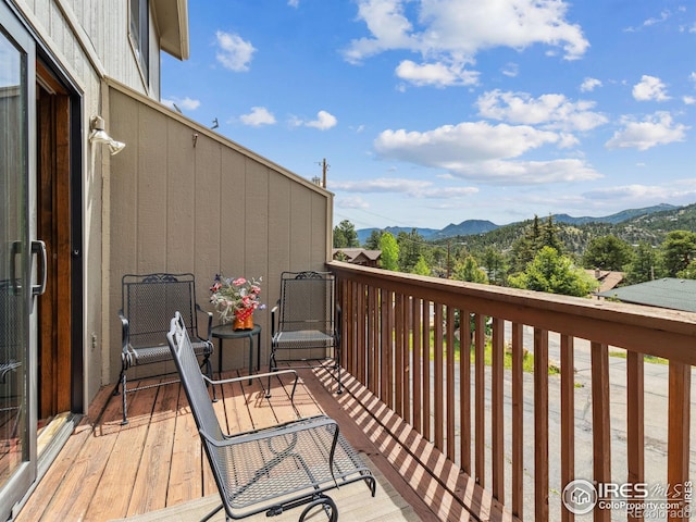 balcony featuring a mountain view