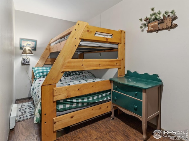 bedroom featuring wood finished floors