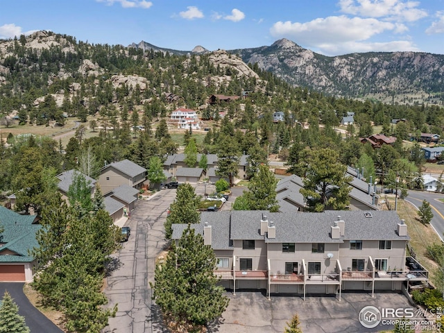 bird's eye view featuring a residential view and a mountain view