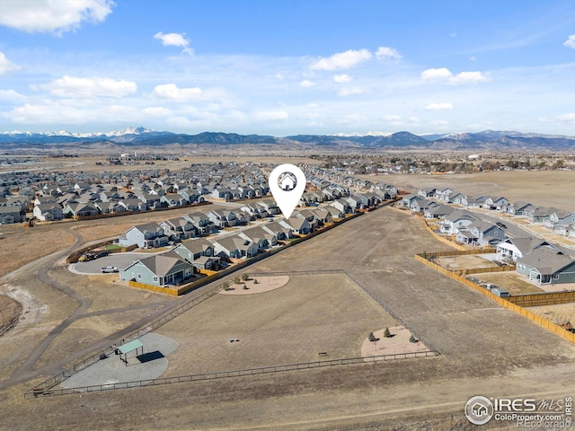 bird's eye view with a residential view and a mountain view