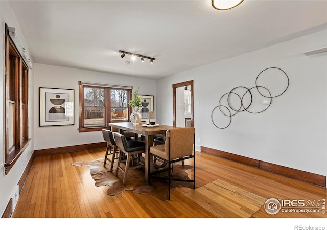530 Laporte Ave, Fort Collins, CO 80521 - dining space featuring hardwood / wood-style flooring and baseboards