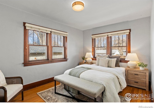 530 Laporte Ave, Fort Collins, CO 80521 - bedroom with baseboards and wood finished floors