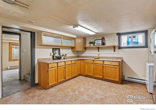 530 Laporte Ave, Fort Collins, CO 80521 - kitchen featuring baseboard heating, a textured ceiling, and open shelves