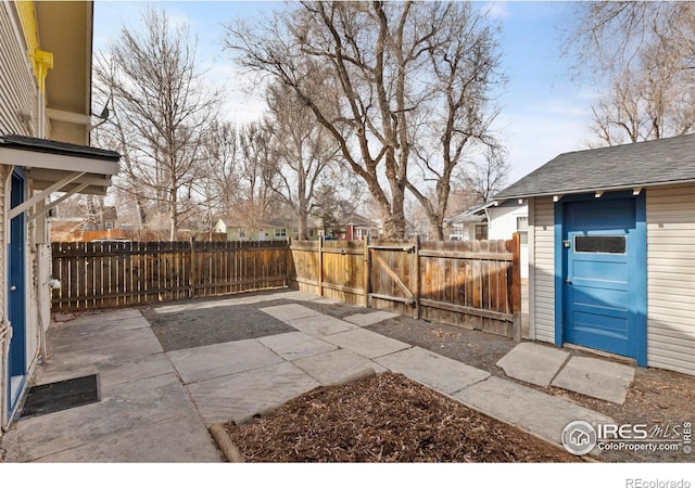 530 Laporte Ave, Fort Collins, CO 80521 - view of patio / terrace featuring fence private yard and an outdoor structure