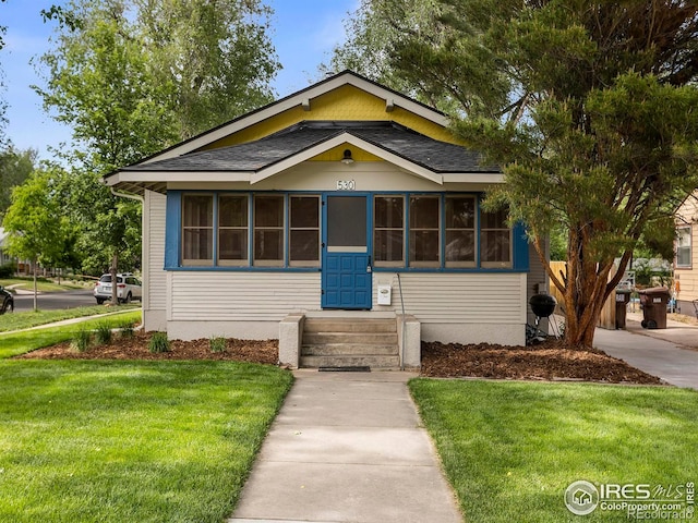 530 Laporte Ave, Fort Collins, CO 80521 - bungalow featuring a front yard and entry steps