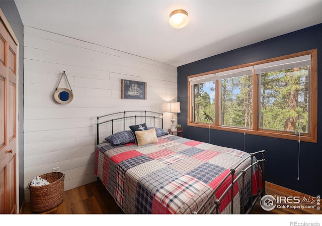 bedroom featuring wood finished floors