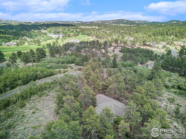 bird's eye view featuring a forest view