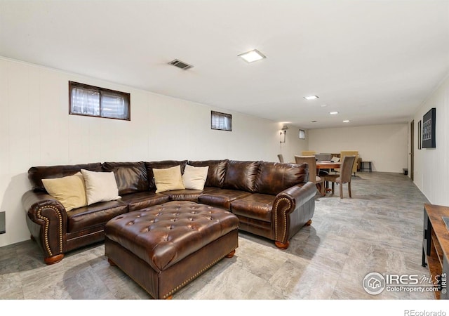 living room featuring visible vents