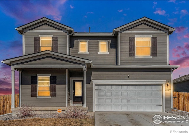 2539 Alto St, Fort Lupton, CO 80621 - traditional-style house with fence, driveway, and an attached garage
