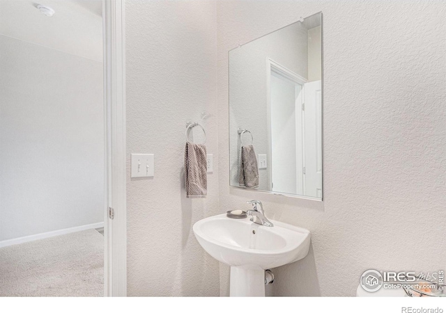 2539 Alto St, Fort Lupton, CO 80621 - bathroom with a sink and a textured wall