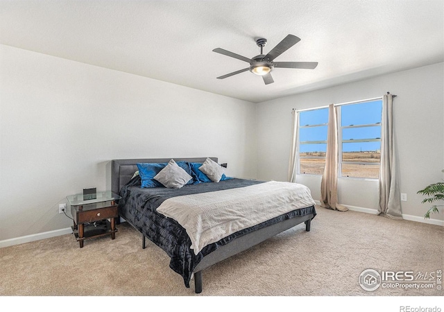 2539 Alto St, Fort Lupton, CO 80621 - bedroom featuring light carpet, a ceiling fan, and baseboards
