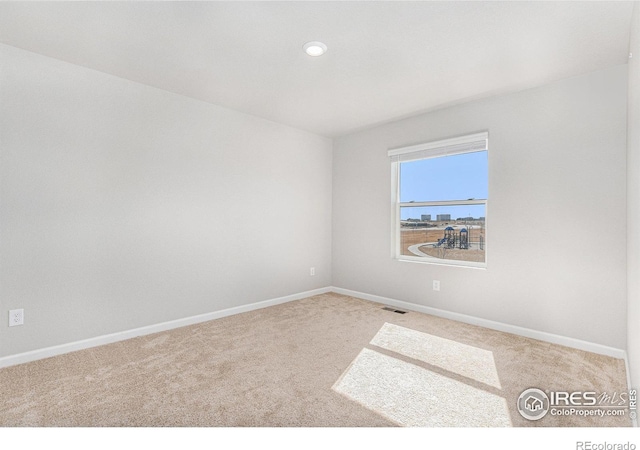2539 Alto St, Fort Lupton, CO 80621 - carpeted empty room featuring visible vents and baseboards