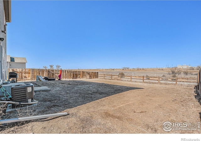 2539 Alto St, Fort Lupton, CO 80621 - view of yard featuring a fenced backyard and central AC unit