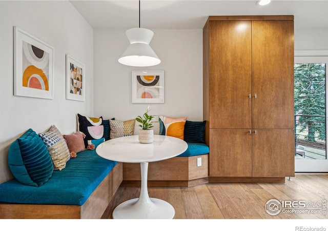 interior space featuring light wood-style floors and breakfast area