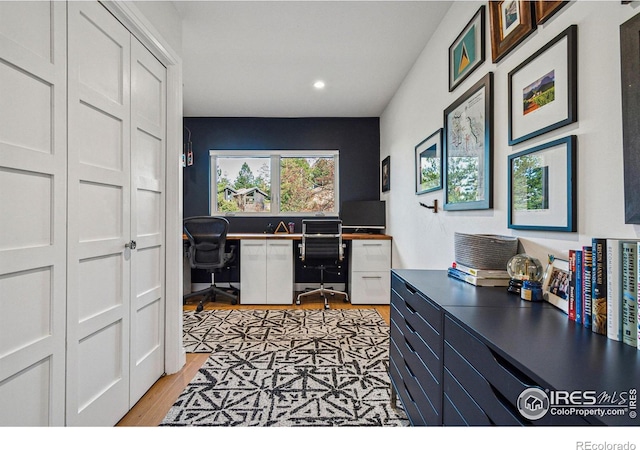 office featuring light wood-type flooring and recessed lighting