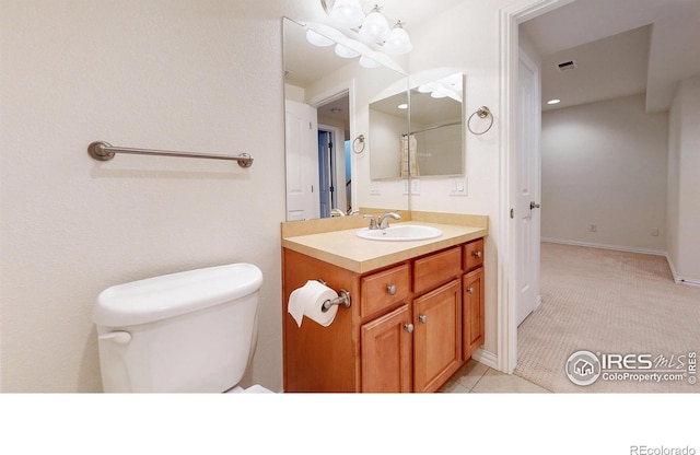 full bath with toilet, visible vents, and vanity