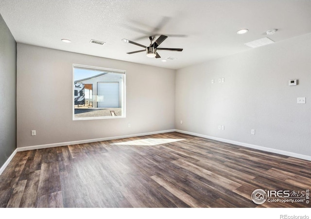 spare room featuring visible vents, ceiling fan, baseboards, recessed lighting, and wood finished floors