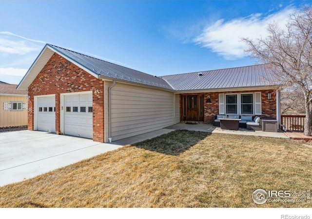 view of front of home featuring metal roof, an outdoor hangout area, brick siding, and a front lawn