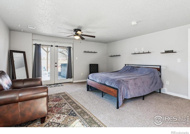 bedroom featuring visible vents, carpet floors, baseboards, french doors, and access to outside