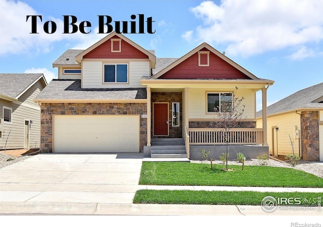 craftsman-style house with covered porch, stone siding, a front lawn, and concrete driveway