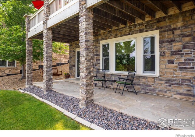 view of patio / terrace with a balcony