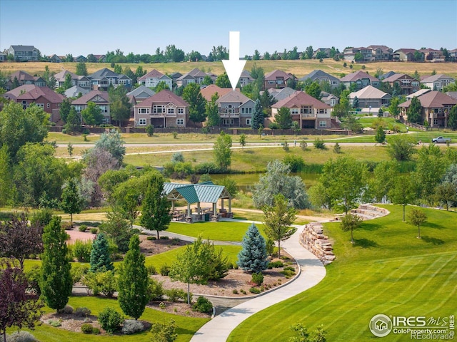 birds eye view of property with a residential view