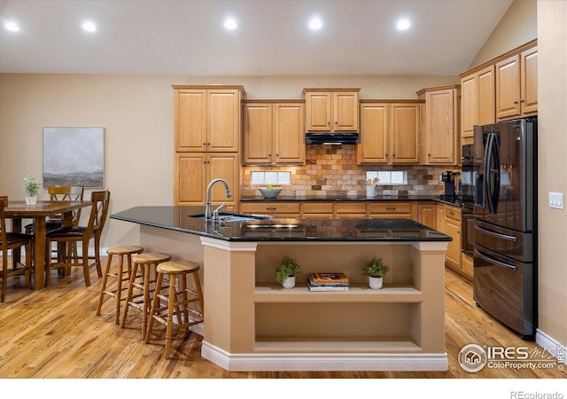 13943 W 87th Ln, Arvada, CO 80005 - kitchen with black appliances, a sink, open shelves, light wood-style floors, and ventilation hood